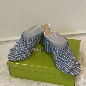 Jean and white Gianni Bini casual slide with round heel.